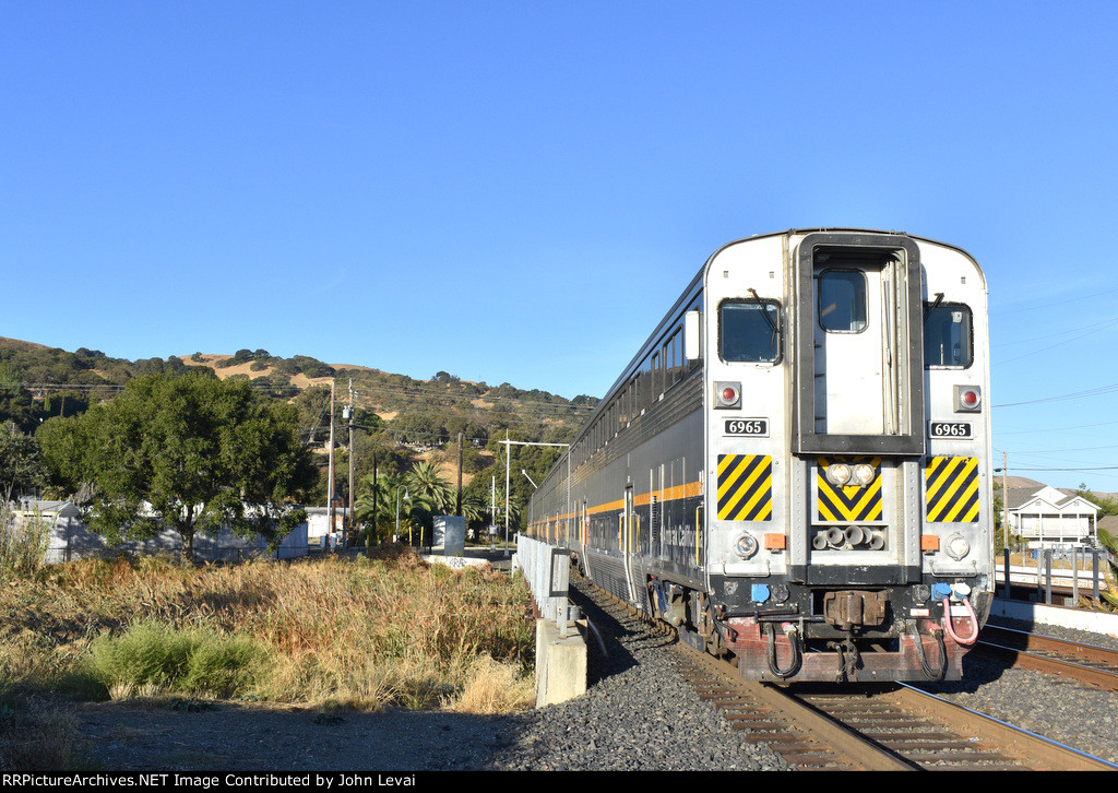 Amtrak San Joaquin Train # 710 arriving into Martinez Station with California Car # 6965 doing the honors